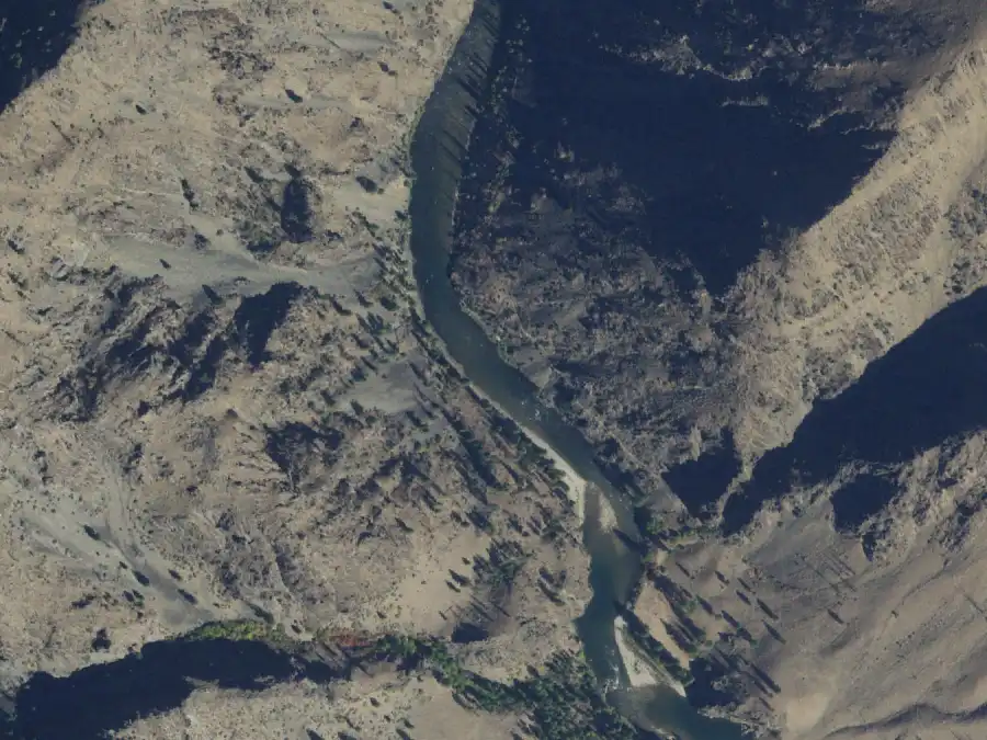 Aerial view of the river around mile 74.8, where Survey Creek is on river left